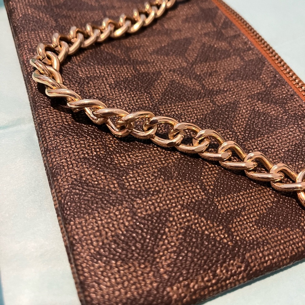 Michael Kor waist belt- it fits a iPhone - measure 41 inches.